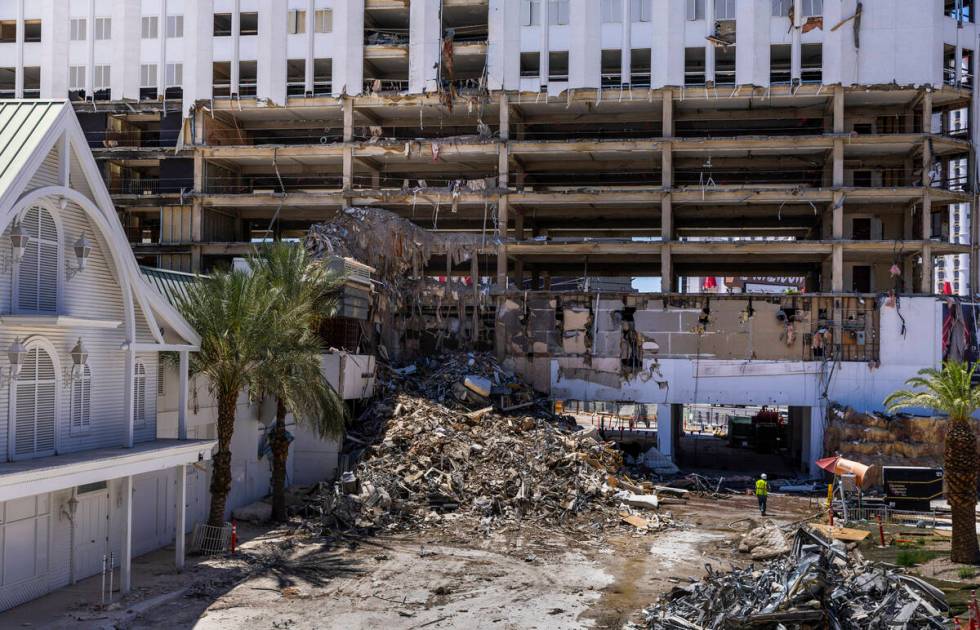 Debris and items from the floors above are piled up near the former entrance as lower floors ar ...