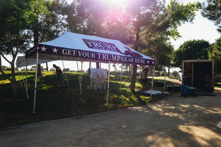 Vendors set up tents the day before former President Donald Trump’s June 9 rally in Suns ...