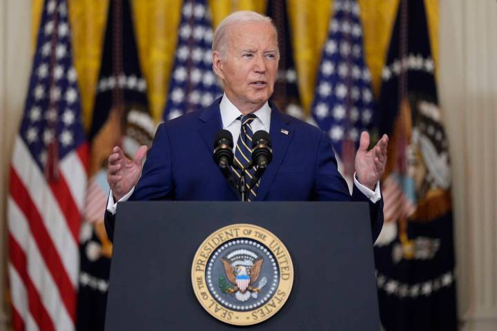 President Joe Biden speaks about an executive order in the East Room at the White House in Wash ...