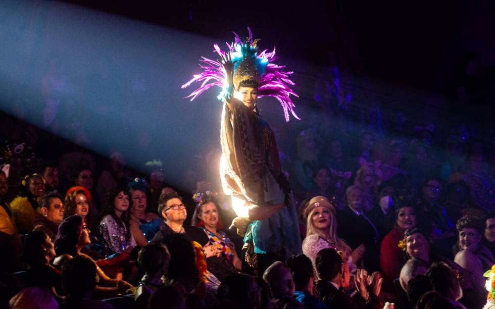 Ruby Champagne, of Los Angeles, performs in the crowd during the “Movers, Shakers and In ...