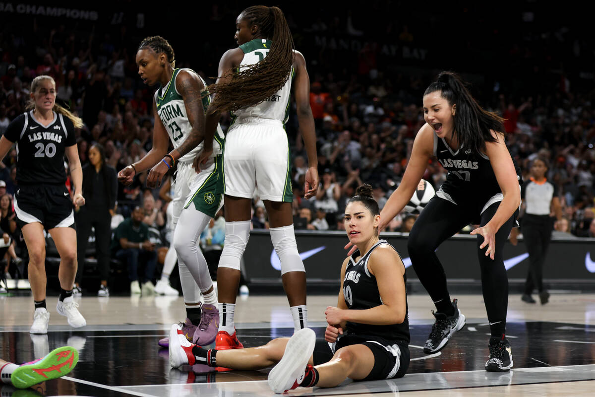Las Vegas Aces guard Kelsey Plum (10) reacts after scoring and drawing a foul from the Seattle ...