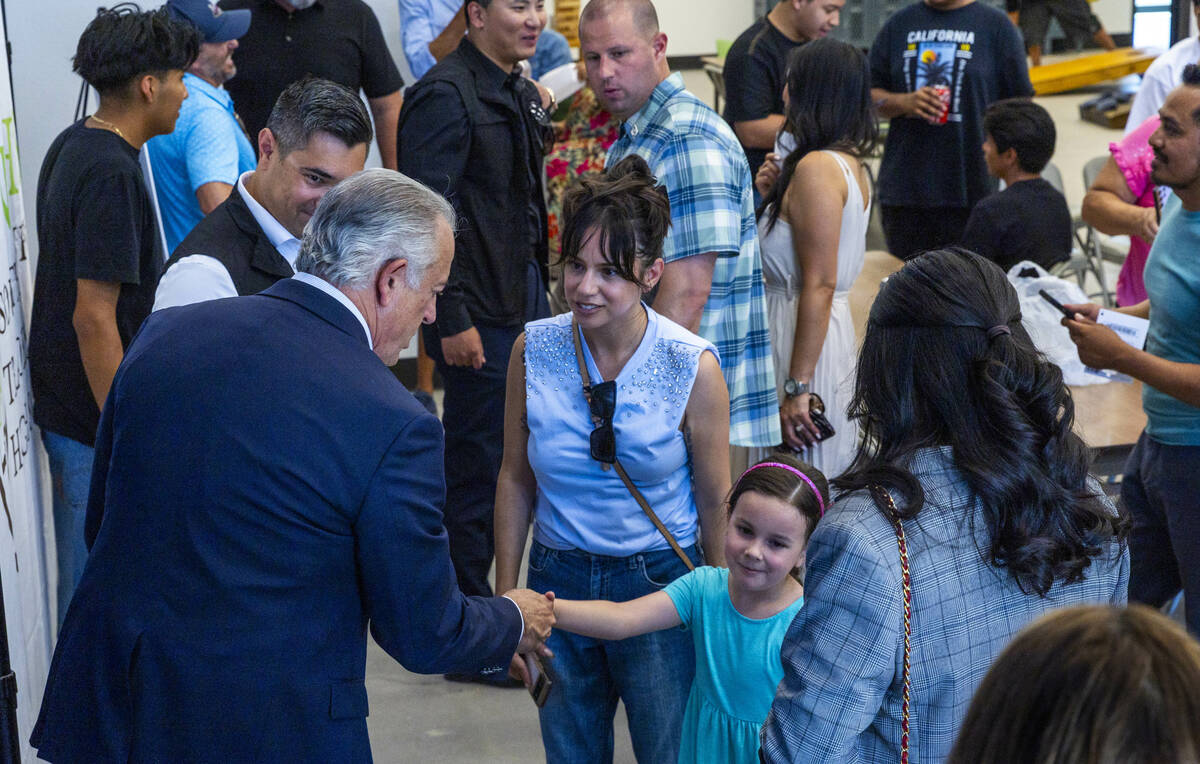 Governor Joe Lombardo visits with student's families during an event at the Southern Nevada Tra ...