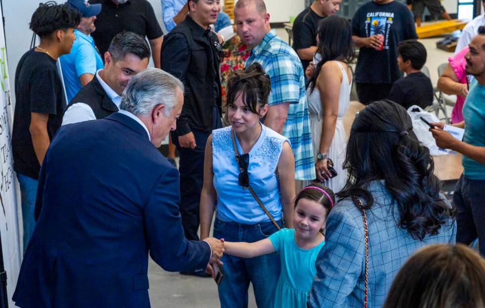 Governor Joe Lombardo visits with student's families during an event at the Southern Nevada Tra ...