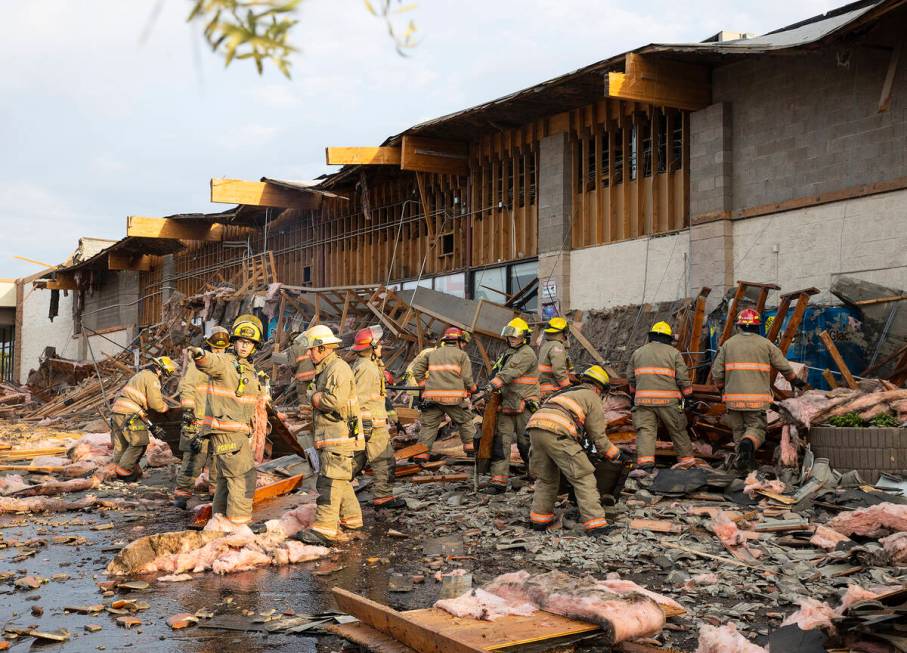 Clark County firefighters work through debris after a portion of La Bonita supermarket collapse ...