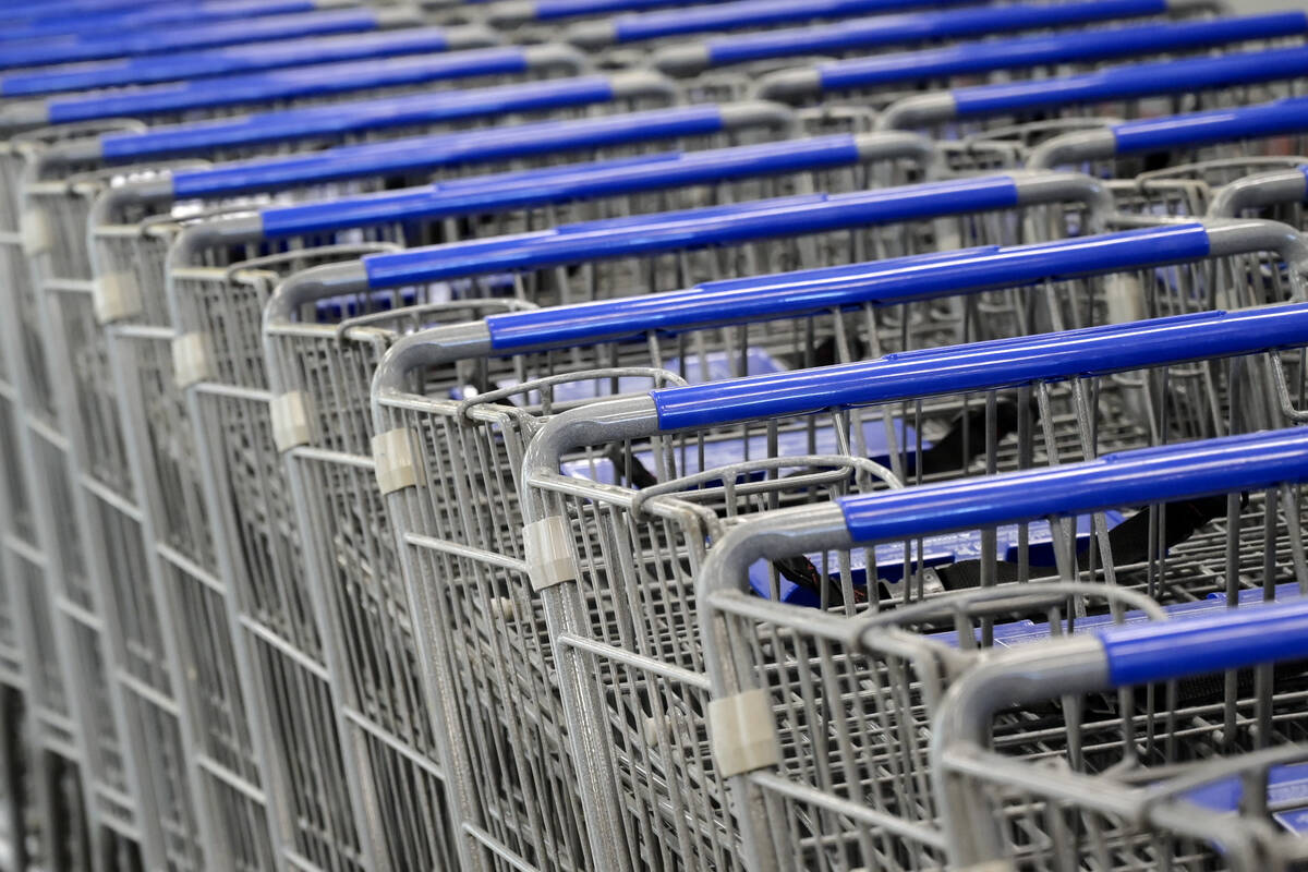 Shopping carts are seen while preparations continue Friday, June 7, 2024, for the reopening of ...