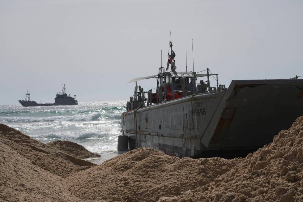 FILE - A U.S. Army landing craft is seen beached in Ashdod, May 26, 2024, after being swept by ...