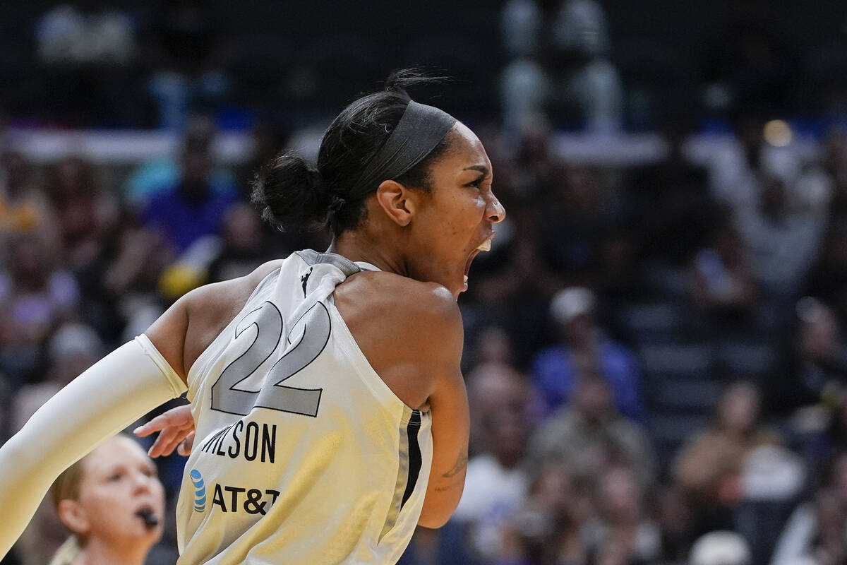 Las Vegas Aces center A'ja Wilson reacts after scoring during the first half of a WNBA basketba ...