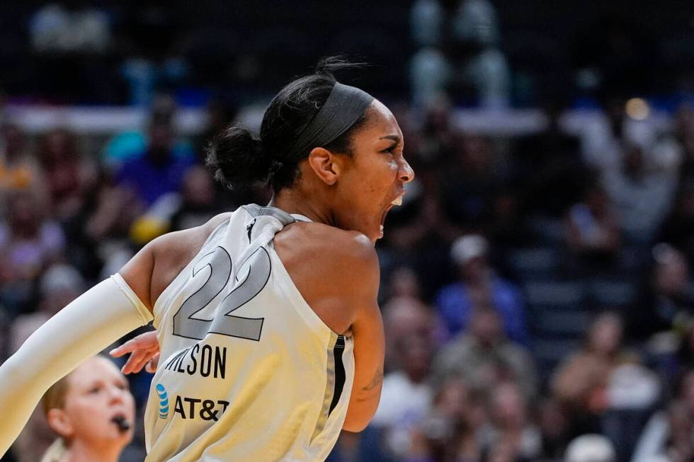 Las Vegas Aces center A'ja Wilson reacts after scoring during the first half of a WNBA basketba ...