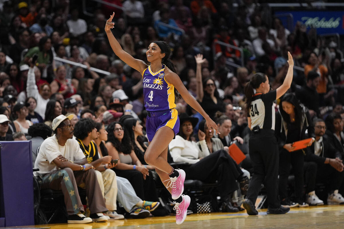 Los Angeles Sparks guard Lexie Brown celebrates a three-point basket during the first half of a ...