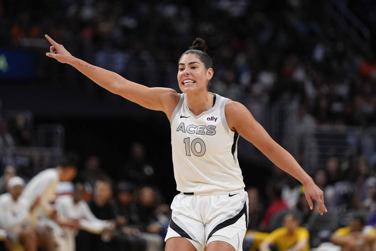 Las Vegas Aces guard Kelsey Plum gestures during the first half of a WNBA basketball game again ...