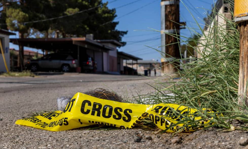 Police tape is seen near where 2-year-old Jacoby Robinson Jr. was found on the 1300 block of Le ...