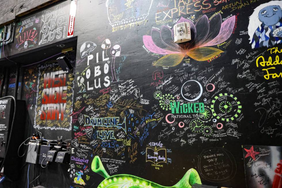 Signatures from stars adorn the backstage walls at The Smith Center in Las Vegas, Wednesday, Ju ...