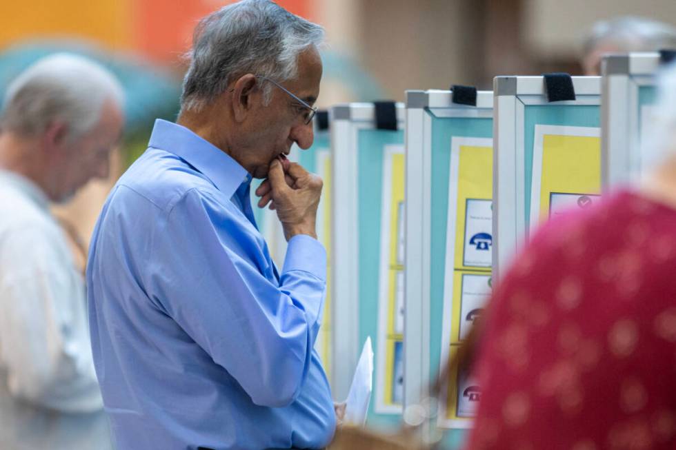 Voters cast their ballots during the Nevada Primary Day Elections on Tuesday, June 11, 2024, at ...