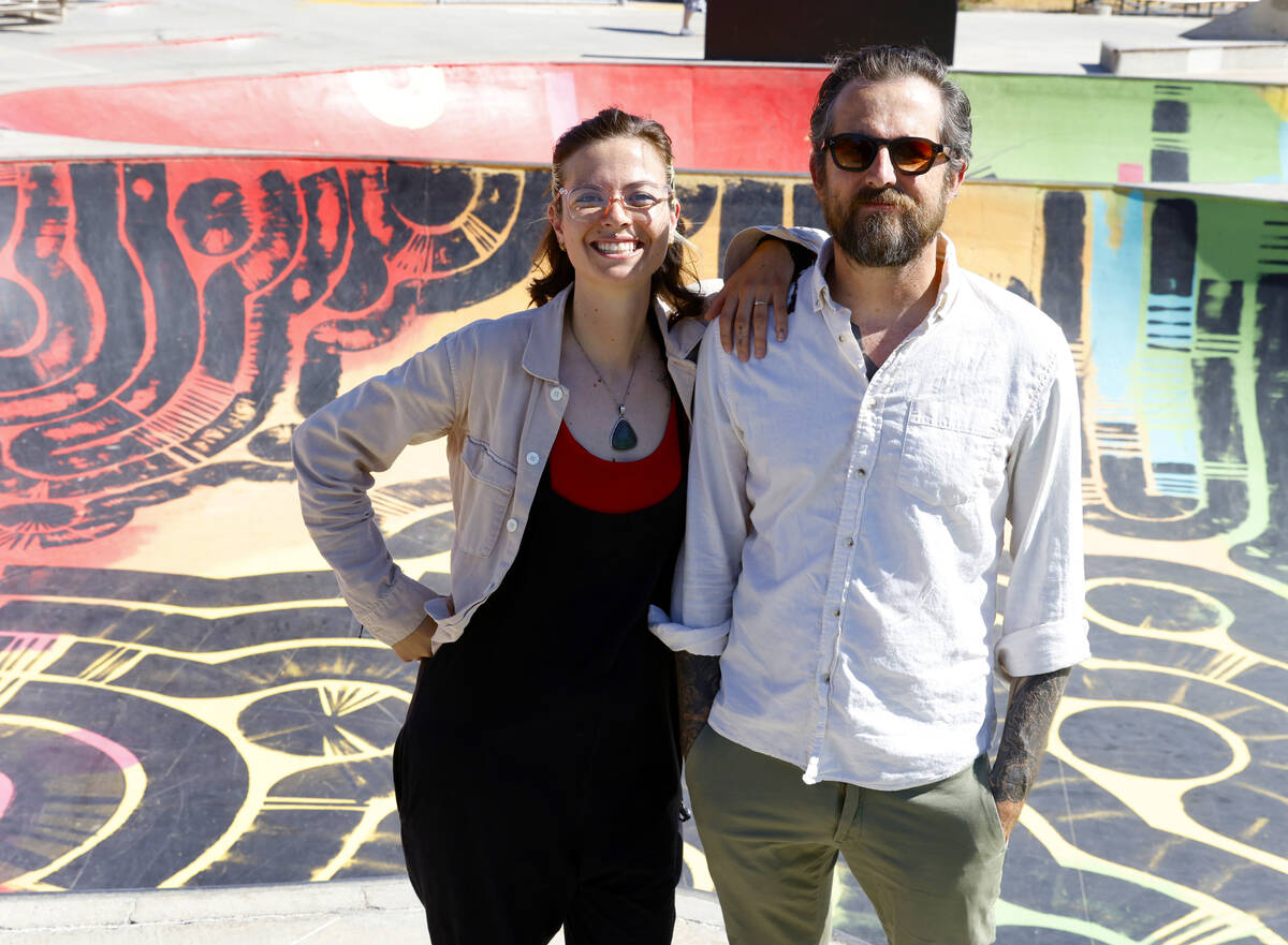 Jess Demlow, left, of Paints with Care, and local muralist and skateboarder Nico Roussin, pose ...