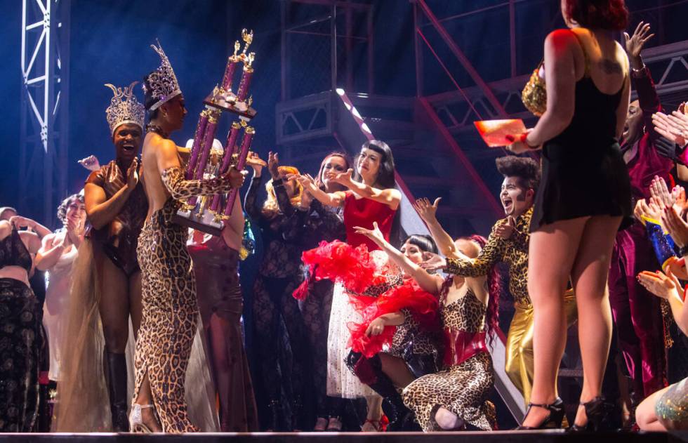 Ms. B LaRose, of Chicago, left, celebrates with friends after being named M- Exotic World in th ...