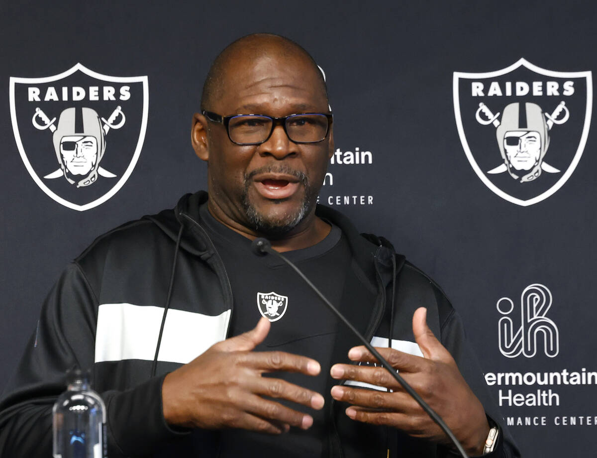 Raiders wide receivers coach Edgar Bennett addresses the media before an NFL football practice ...