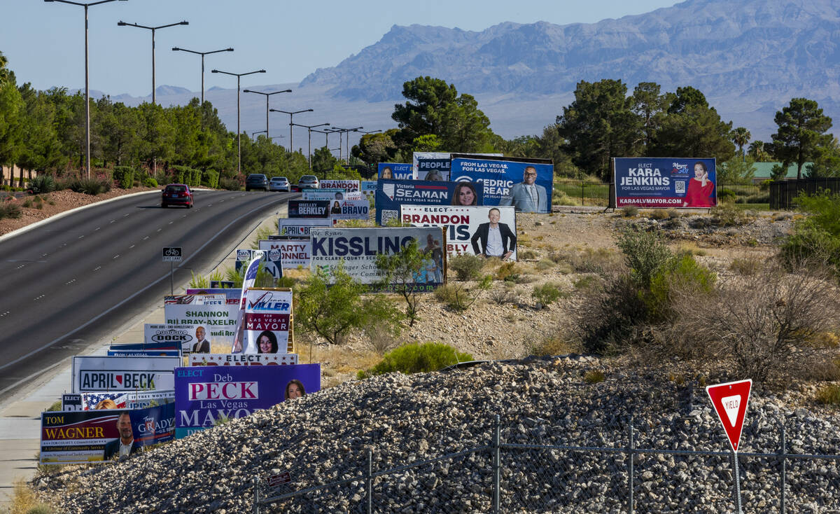 Candidate signs are stacked up to be viewed along North Rampart Boulevard by voters on Nevada's ...