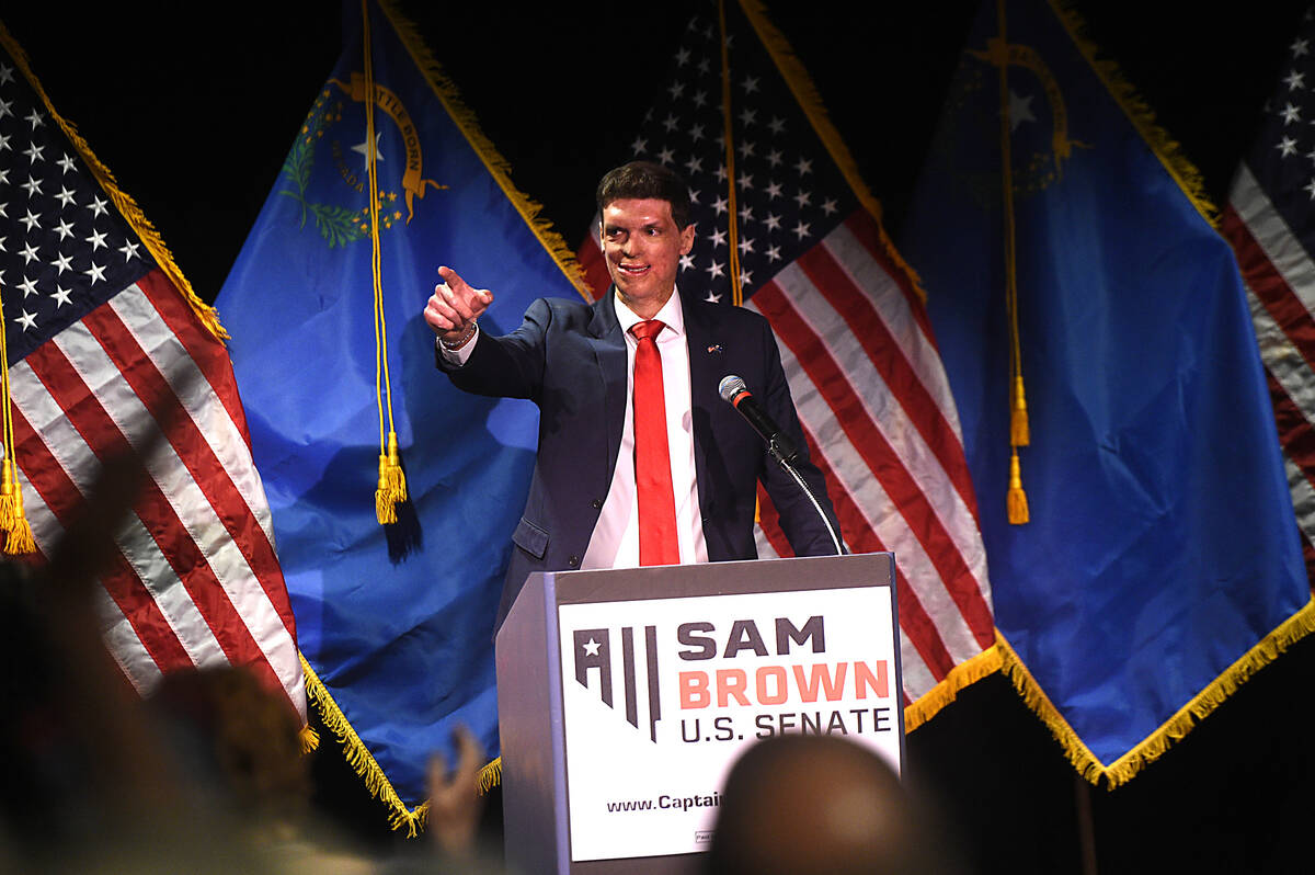 Republican candidate for U.S. Senate Sam Brown greets the crowd during his acceptance speech at ...