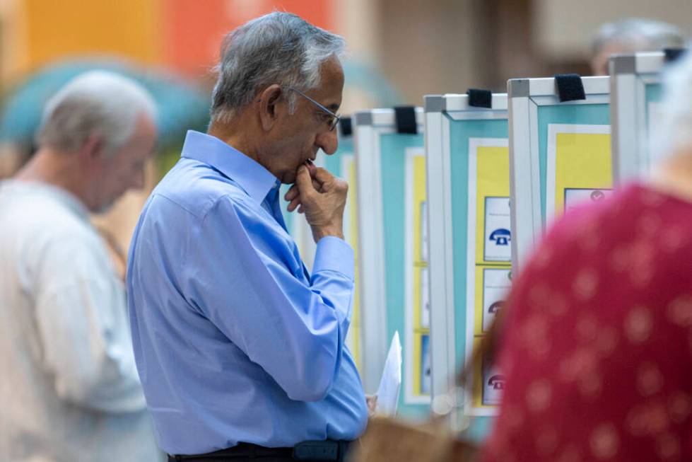 Voters cast their ballots during the Nevada Primary Day Elections on Tuesday, June 11, 2024, at ...