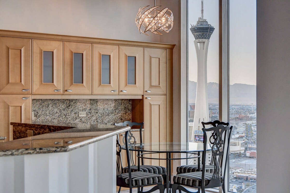 The breakfast nook has a front-row seat to the city's famous Strip. (Douglas Elliman Real Estate)