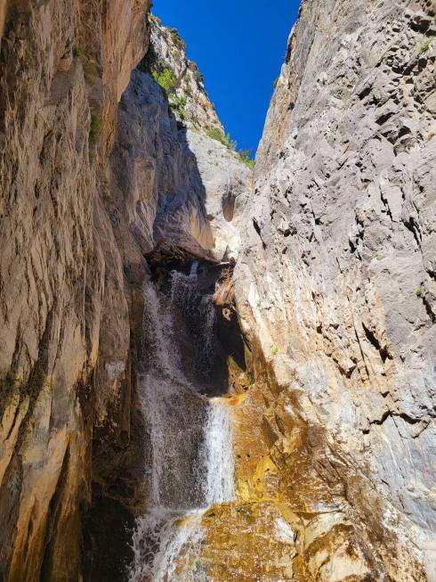 Water pours over rocks in June at the end of Kyle Canyon’s Little Falls trail, which rem ...