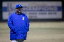 Bishop Gorman head coach Chris Sheff watches from third base during a high school baseball cham ...