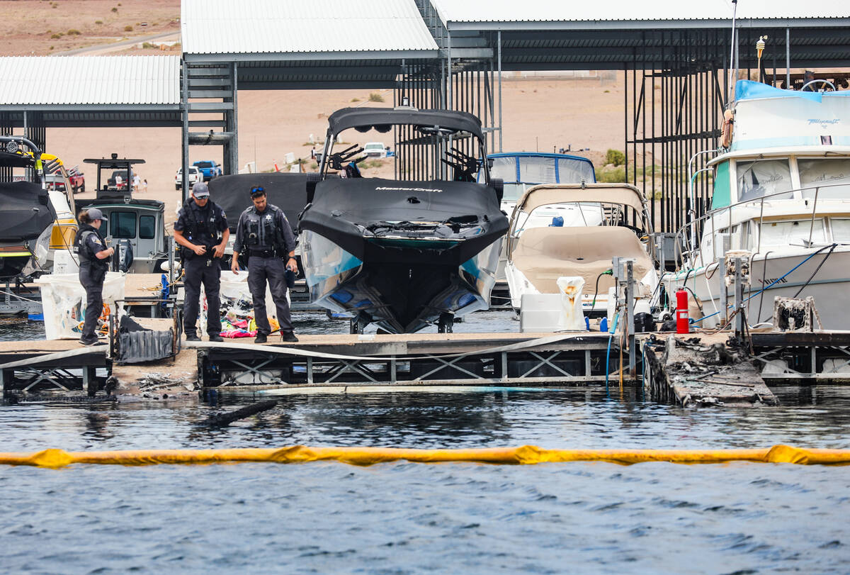 Officials at the scene where a fire sank 10 boats, did damage to several more and caused minor ...
