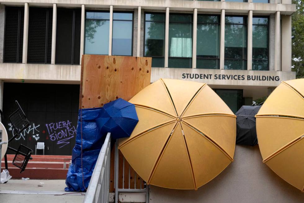 A barricade and graffiti are seen left by pro-Palestinian protesters at the Student Services Bu ...