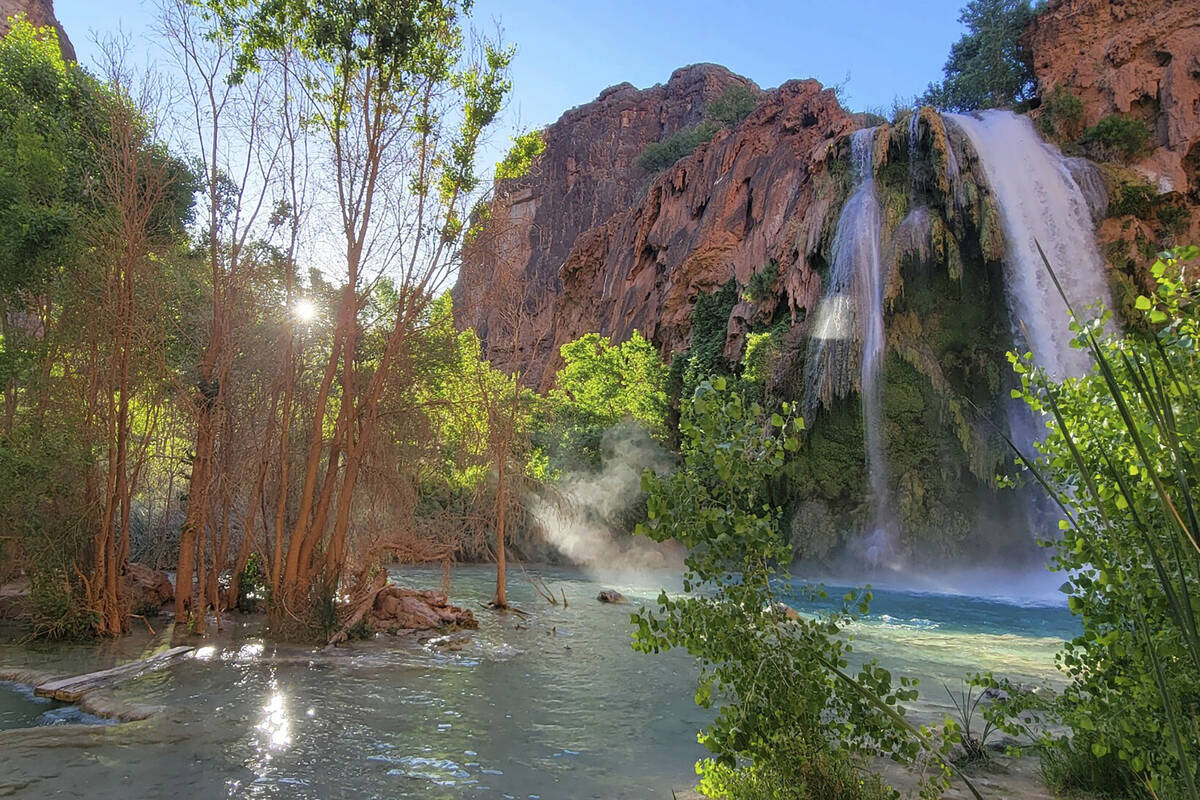 This photo provided by Randy Shannon shows Mooney Falls on the Havasupai reservation outside th ...