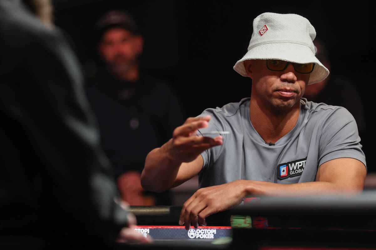 Phil Ivey competes during the final table of the $10,000 buy-in Limit 2-7 Triple Draw Champions ...