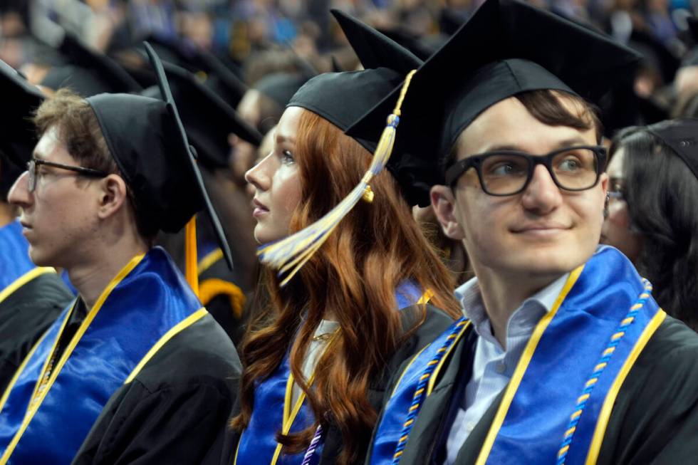 UCLA graduates sit in attendance at their commencement ceremony at Pauley Pavilion, Friday, Jun ...