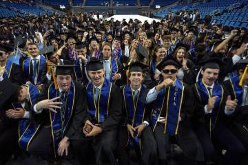 UCLA graduates from the class of 2024 pose for a photo prior to their commencement ceremony at ...