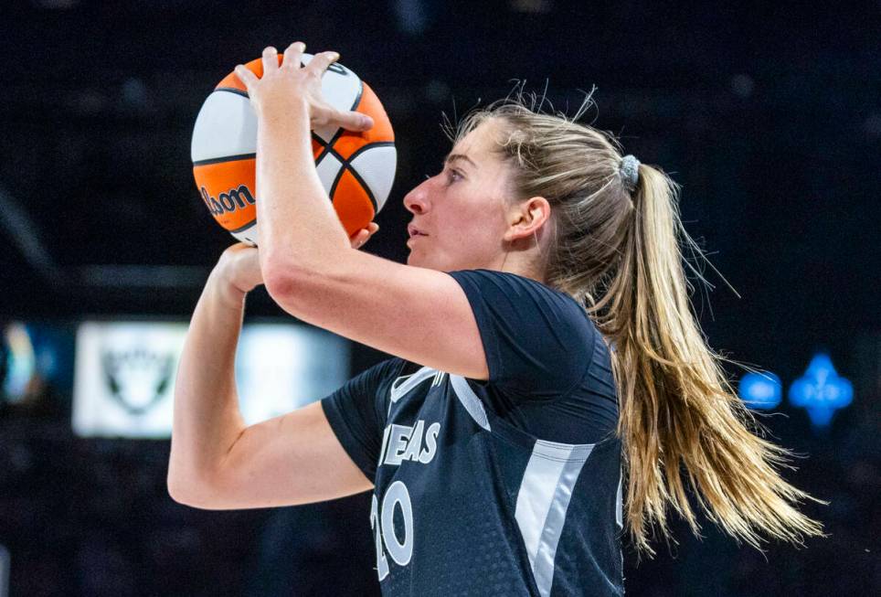 Aces guard Kate Martin (20) looks to shoot a basket against the New York Liberty during the sec ...