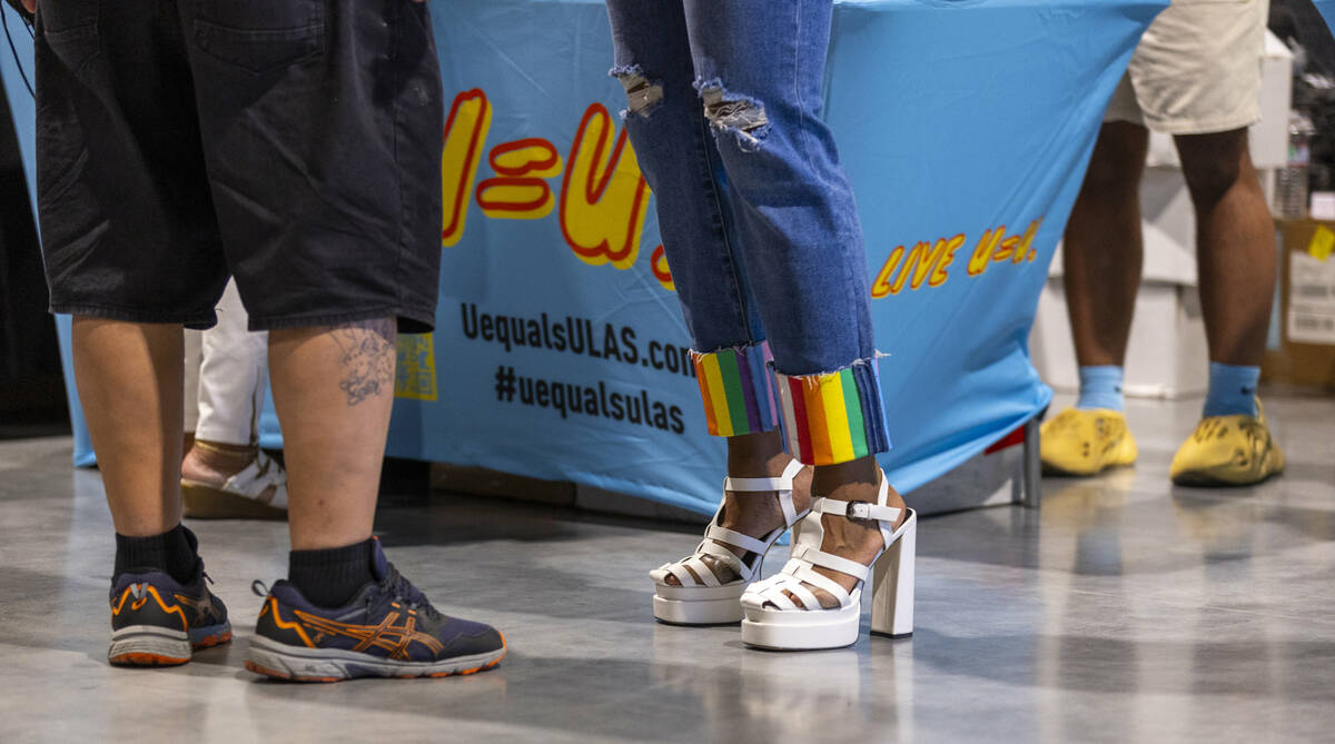 Attendees enjoy the 23rd annual Las Vegas Juneteenth Festival in The Expo at World Market on Sa ...