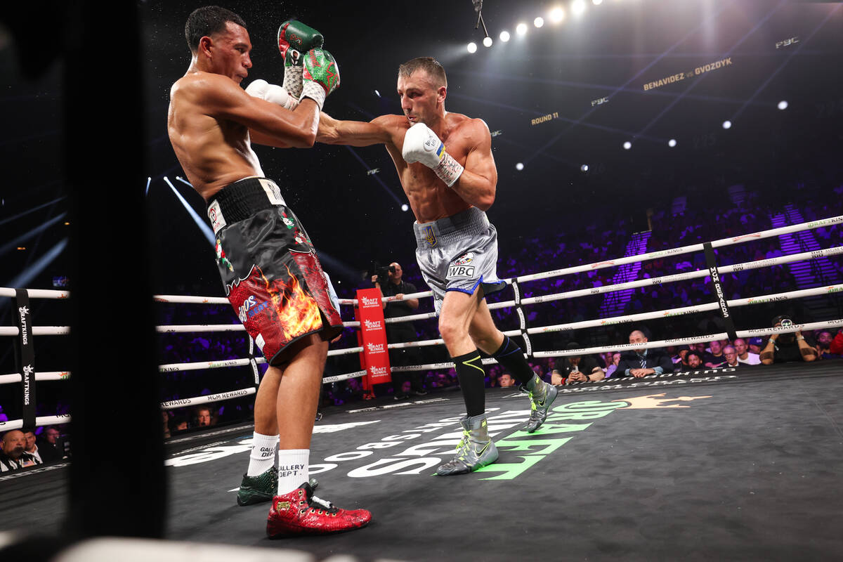 David Benavidez, left, ducks a punch from Oleksandr Gvozdyk during a WBC interim world light he ...