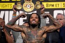 Gervonta Davis poses on the scale during a weigh-in Friday, June 14, 2024, in Las Vegas. Davis ...