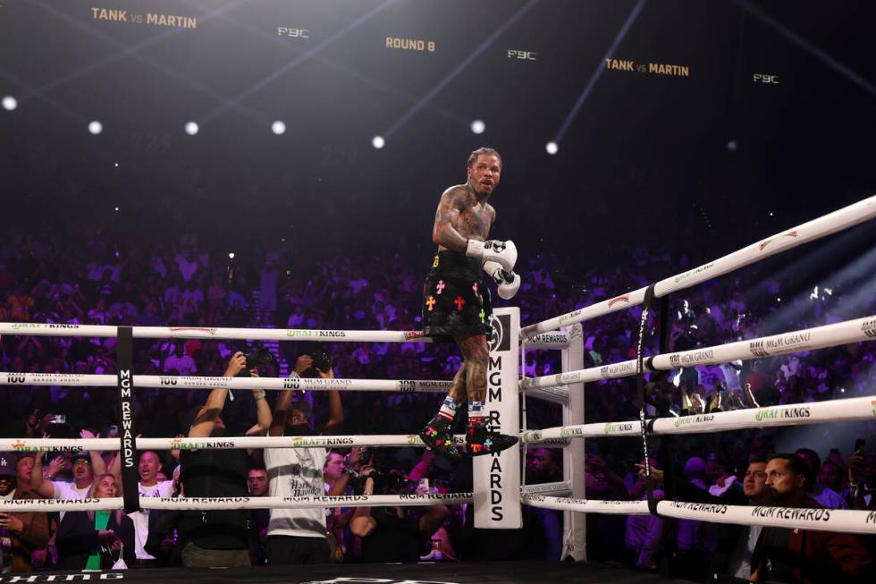 Gervonta “Tank” Davis celebrates after knocking out Frank Martin during a WBA wor ...