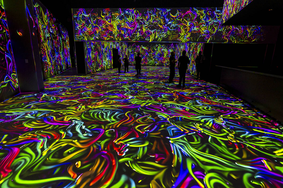 Projections of colorful cords cover the floor and walls at Electric Playhouse, a new high-tech ...