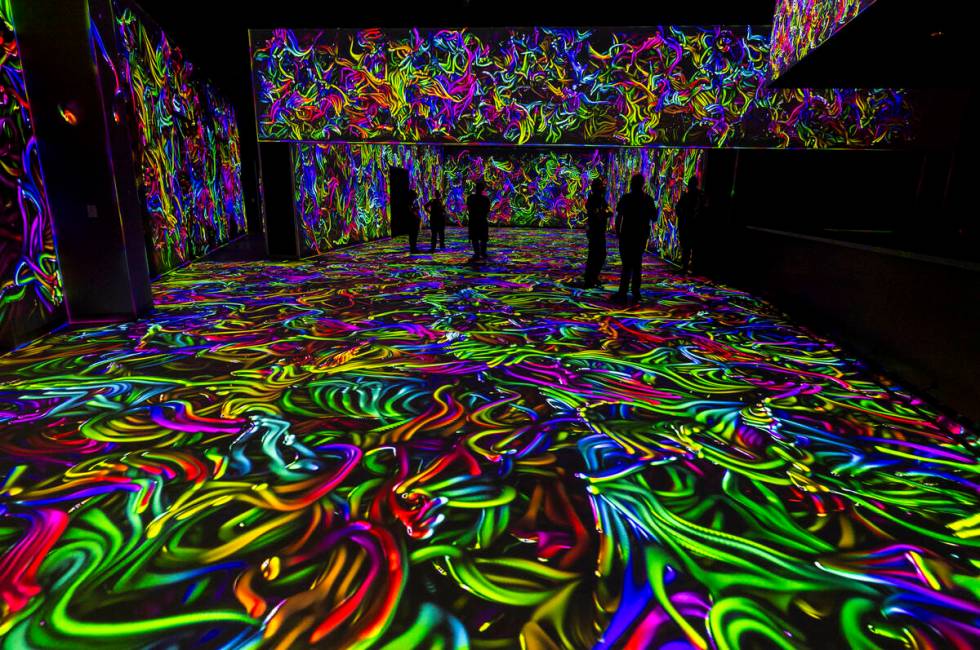 Projections of colorful cords cover the floor and walls at Electric Playhouse, a new high-tech ...