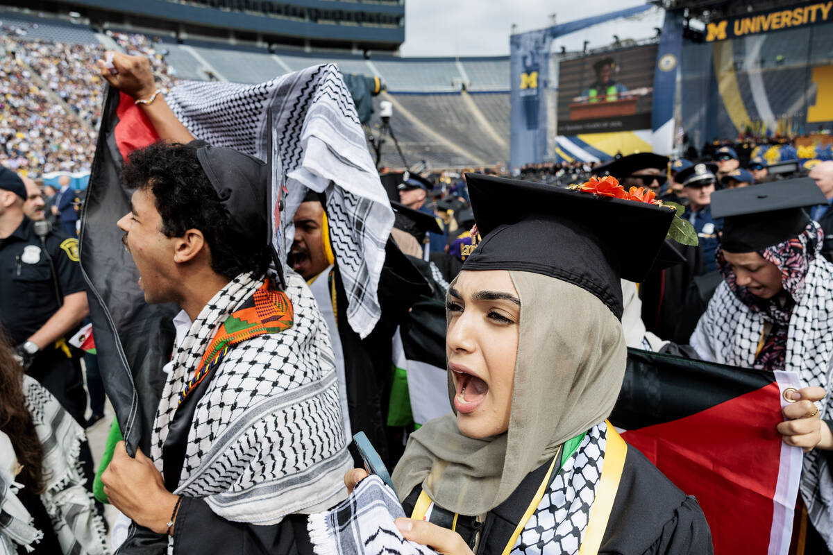 Pro-Palestinian protesters demonstrate during the University of Michigan's Spring 2024 Commence ...