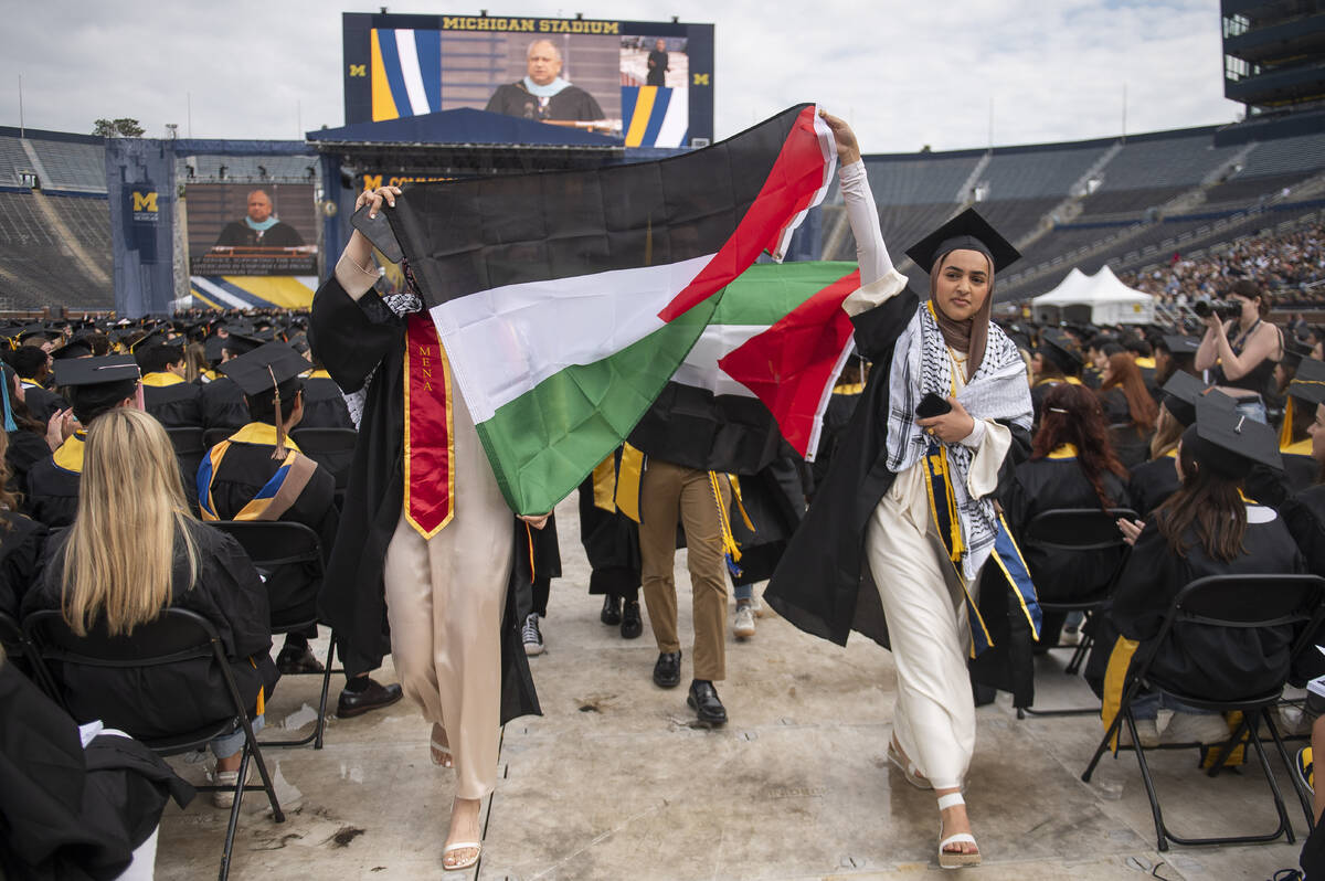 Pro-Palestinian protesters demonstrate during the University of Michigan's Spring 2024 Commence ...
