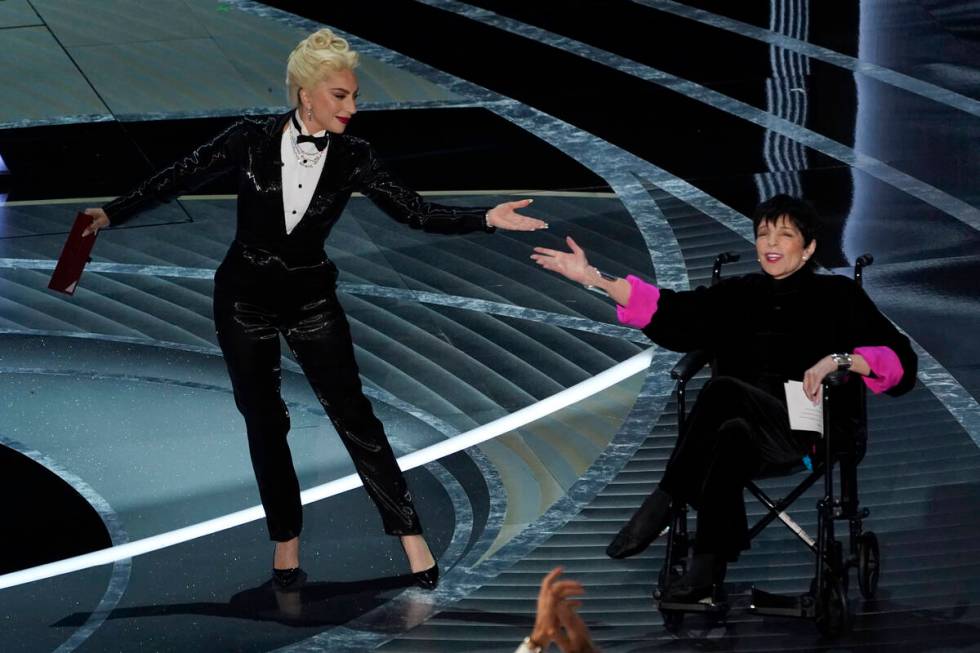 Lady Gaga, left, and Liza Minnelli present the award for best picture at the Oscars on Sunday, ...