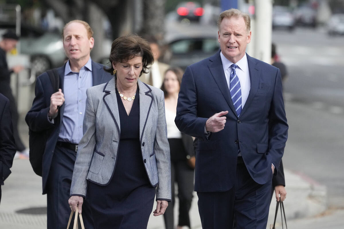 NFL Commissioner Roger Goodell, right, arrives at federal court Monday, June 17, 2024, in Los A ...