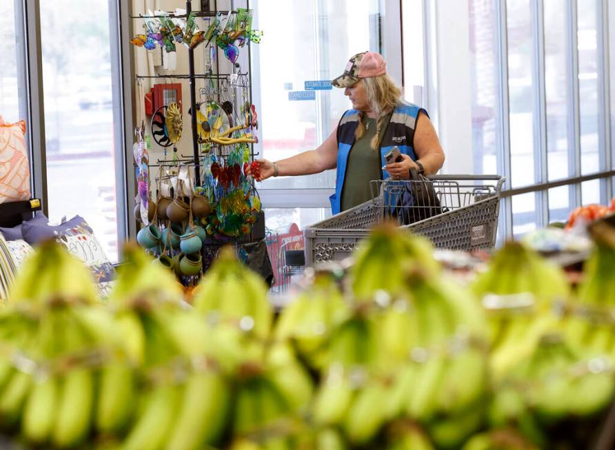 Janell Jennings shops at Grocery Outlet Bargain Market, on Wednesday, June 19, 2024, in Las Veg ...