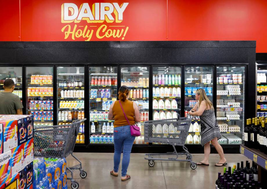 Shoppers navigate through the dairy aisle at Grocery Outlet Bargain Market, on Wednesday, June ...