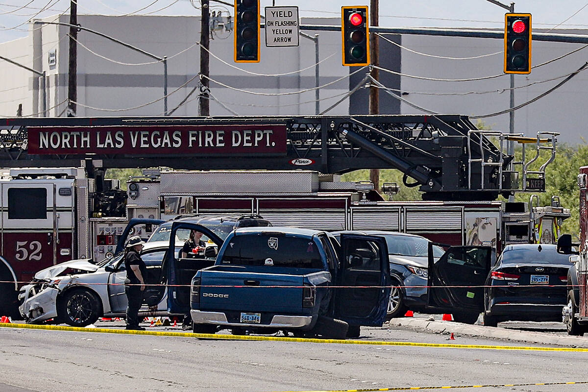 Police at the scene where the North Las Vegas Police Department shot and killed a man who repor ...