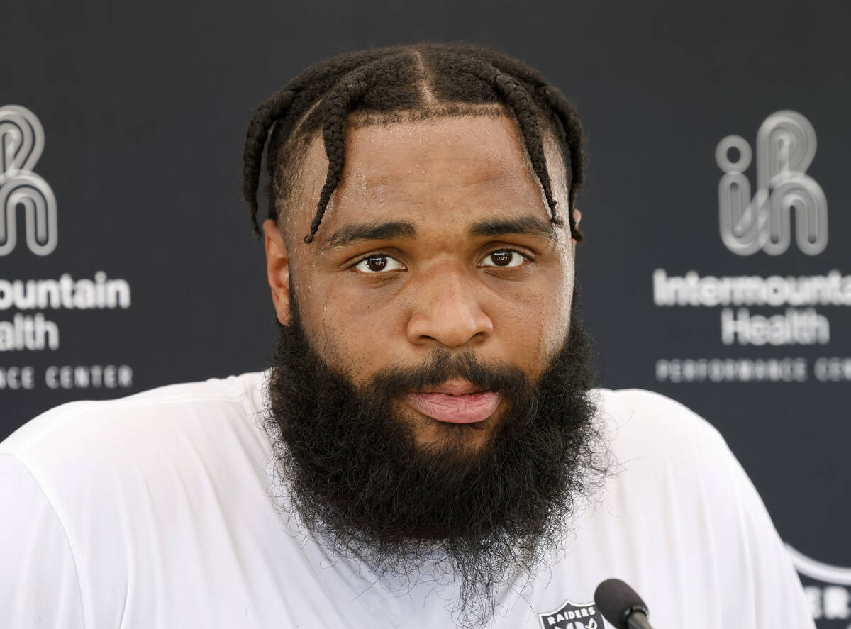 Raiders defensive tackle Christian Wilkins addresses the media after an NFL football practice a ...
