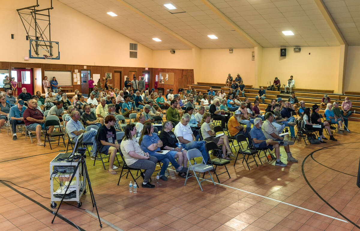 The community building is full as Rover Critical Minerals hosts a town hall for residents conce ...