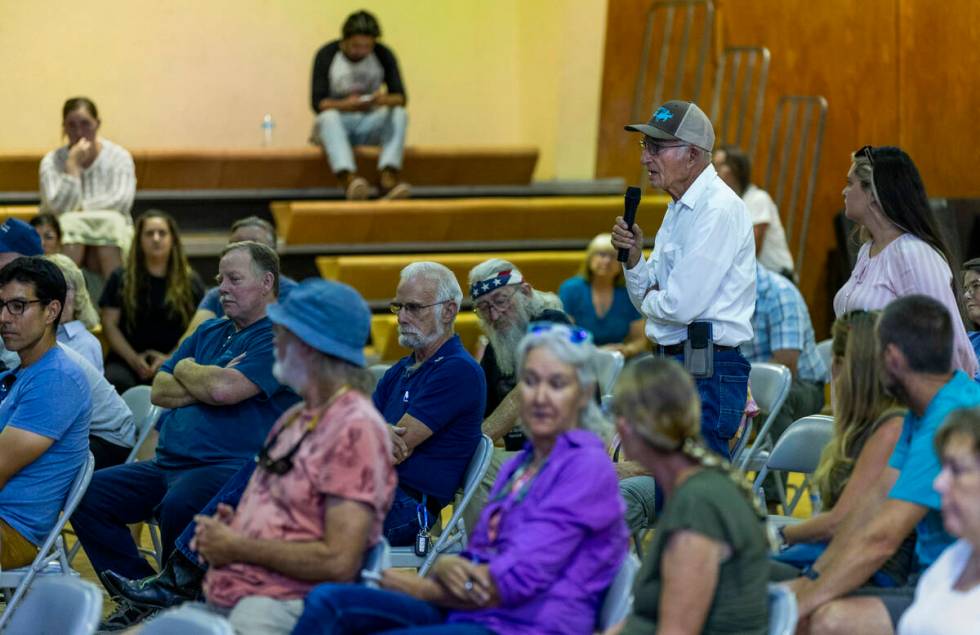 Albert Carter asks a question of Rover Critical Minerals CEO Judson Culter as the company hosts ...