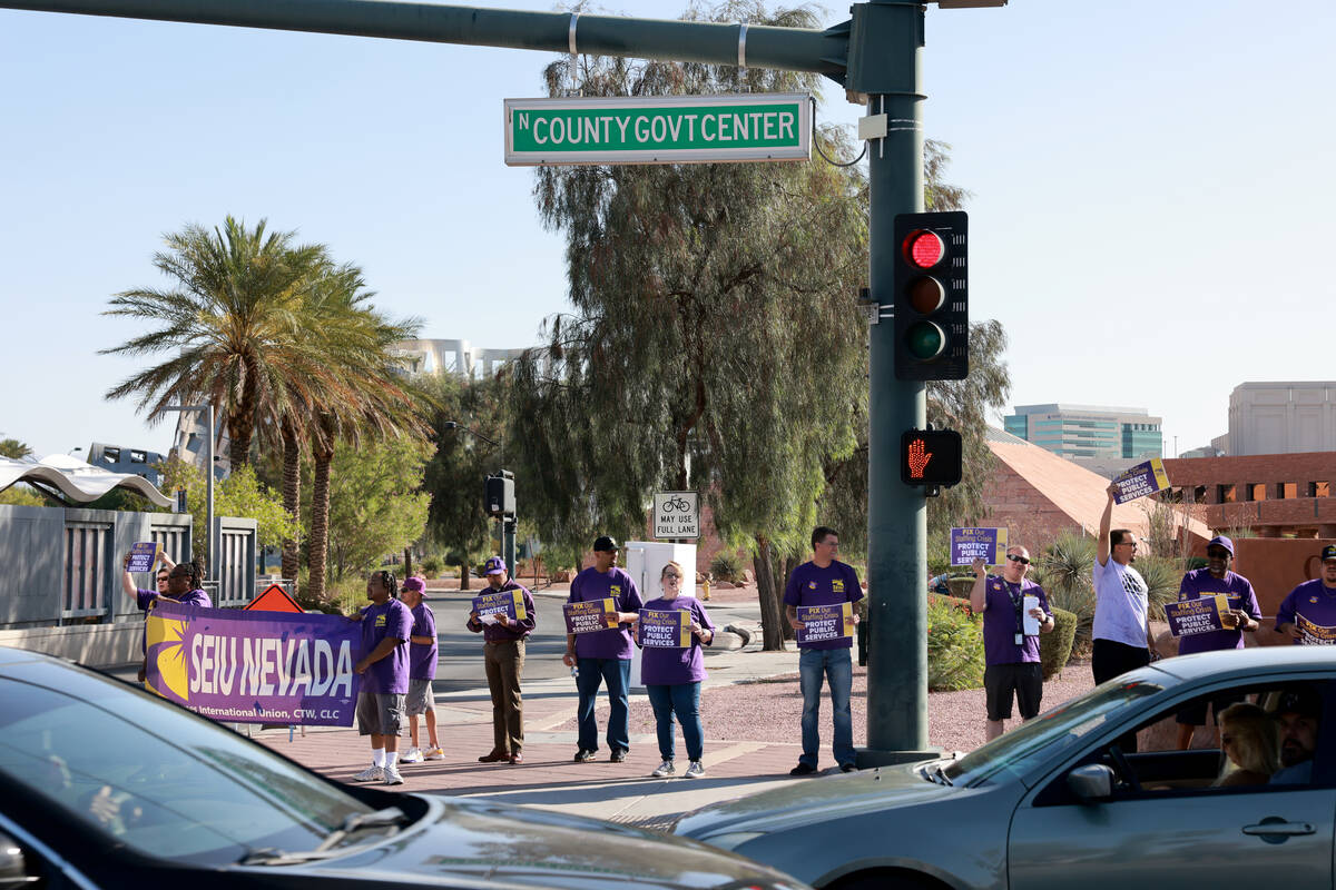 Clark County employees rally outside the Clark County Government Center in Las Vegas Tuesday, J ...